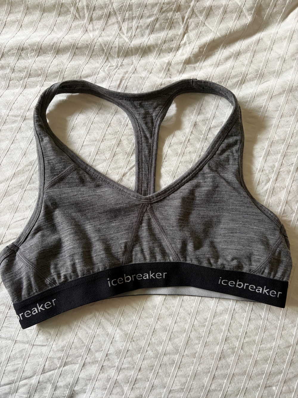 ICEBREAKER- size medium Sprite Racerback Bra in the colorway Gritstone Heather.